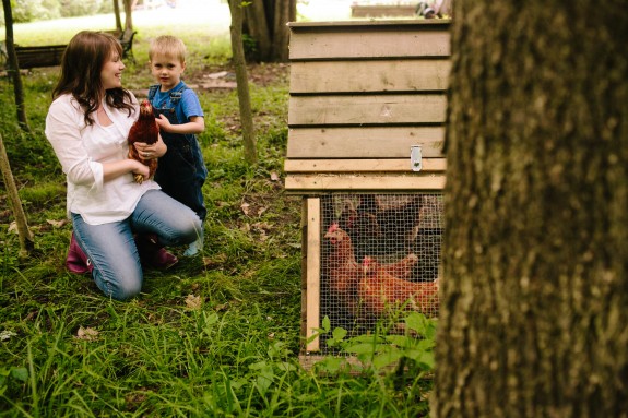 Aimee & Mateo with chickens