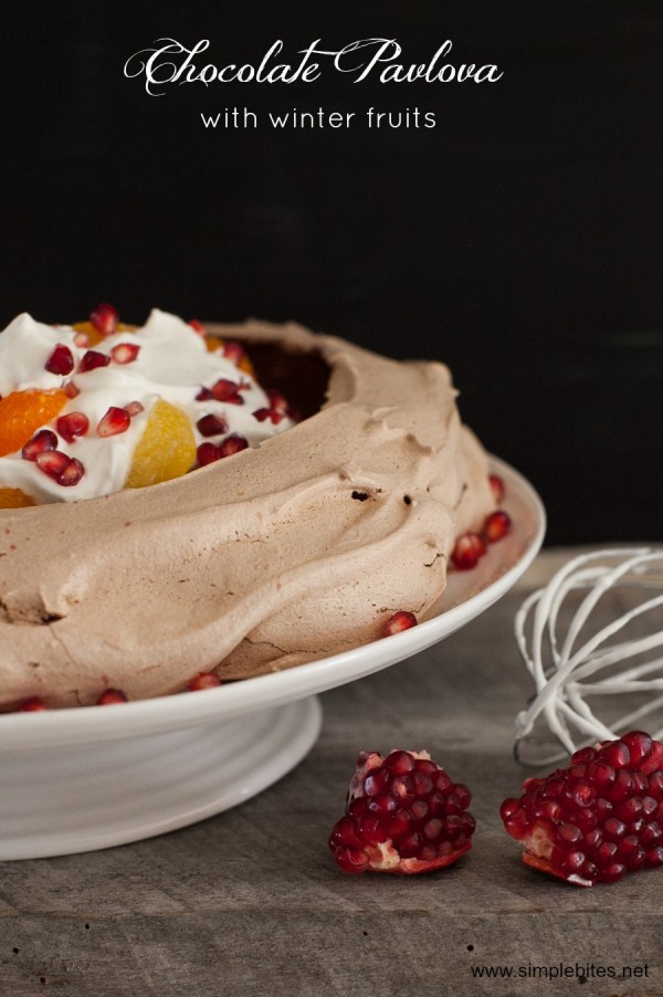 Chocolate Pavlova with Whipped Cream and Winter Fruits on www.simplebites.net #dessert #holiday