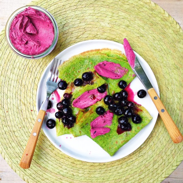 Spinach crepes with berry butter