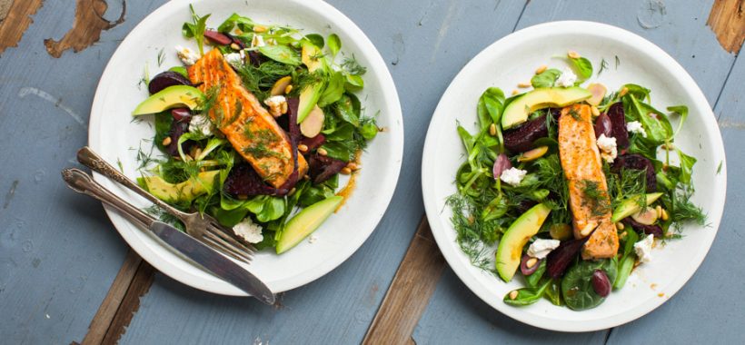 Warm salmon & spinach salad with roasted beets, avocado and feta